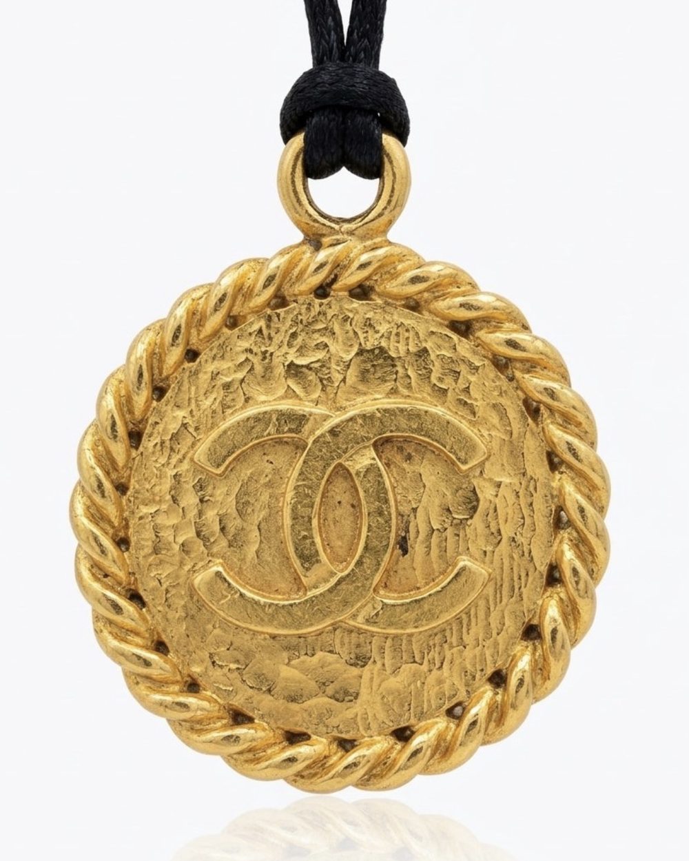 Rope Medallion on cord, charm close-up — Maison Dorée vintage charm necklace