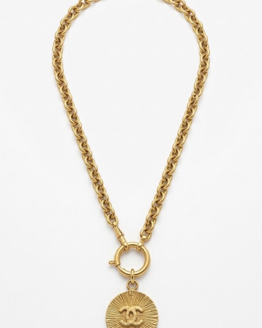 Sunburst on chain, product photo — Maison Dorée vintage charm necklace